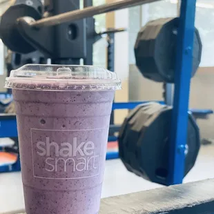 a smoothie in a plastic cup