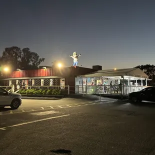 the outside of a shake station at night
