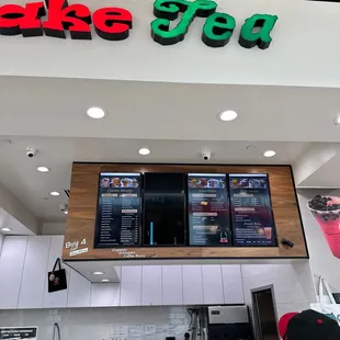 customers at counter with menus