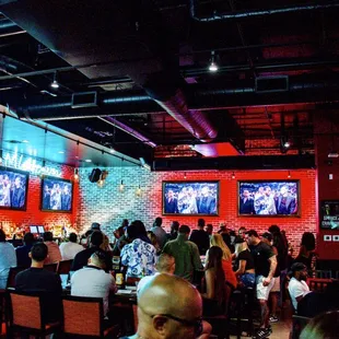 a large group of people in a restaurant