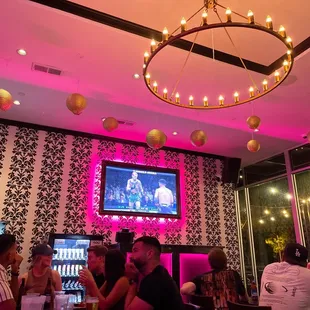 people sitting at a bar