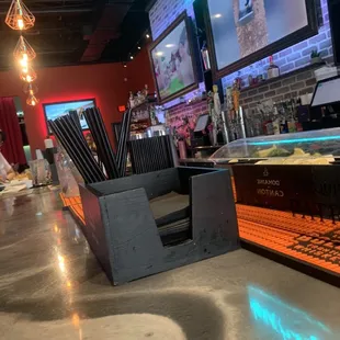 a bar with a neon sign
