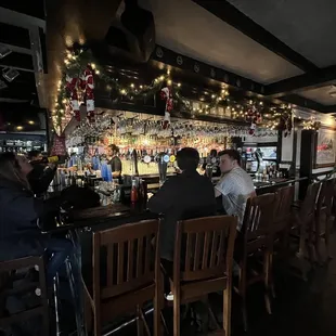 people sitting at the bar