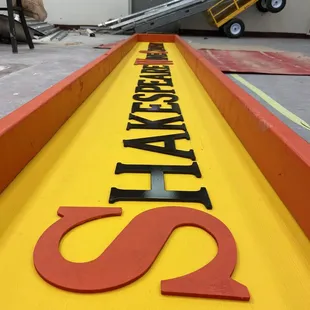a sign on a conveyor belt