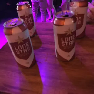 a group of beer cans on a table