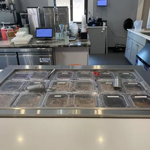 a counter with a variety of food items