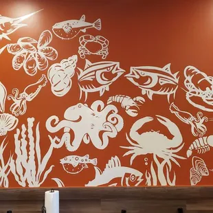 a mural on the wall of a restaurant