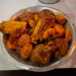 1/2 LB Shrimp (Head off), Sausage(1/2 lb), 1/2 lb Crawfish.