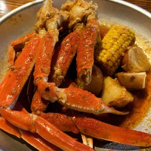 Snow crab legs with corn and potatoes