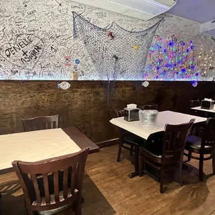 a restaurant with a map on the wall