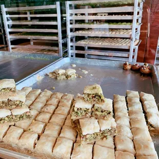 a tray of baklaas in a bakery
