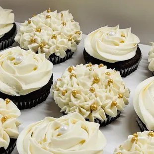 Chocolate espresso cupcakes with out signature buttercream frosting!