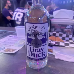 Signed bottle of gray duck
