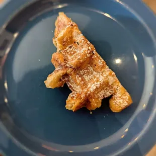Liege waffle.. A kind sample to try.. Very good.. Buttery, served warm, crispy exterior, and soft inside.