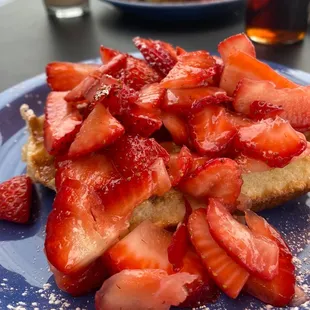 strawberries on a piece of bread