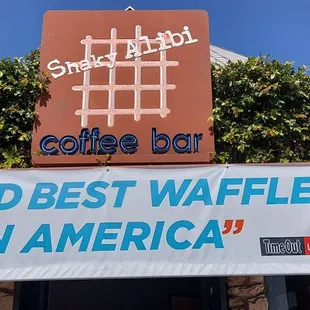 a sign that reads vote best waffles in america