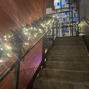 Stairs up to balcony seating.
