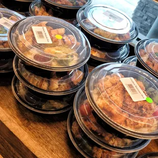 a variety of food in plastic containers