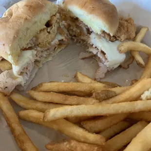 Dirty Bird with fries.  Smoked turkey, provolone, onion ring with chipotle ale Aioli