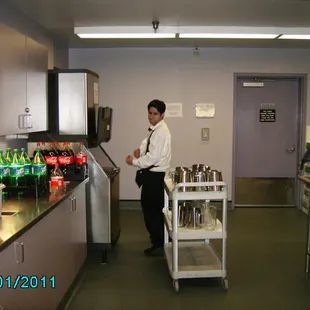 a man standing in a kitchen
