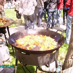 a large pan of food being cooked