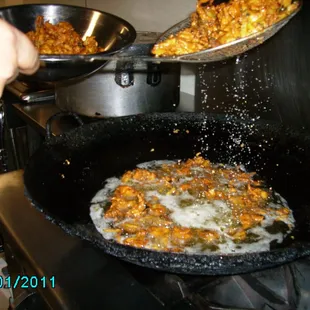 a frying pan of food