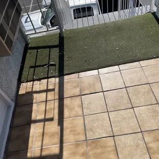 Outside my room, a filthy carpet.