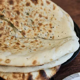 a stack of flatbreads on a plate