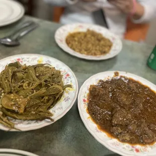 three plates of food on a table