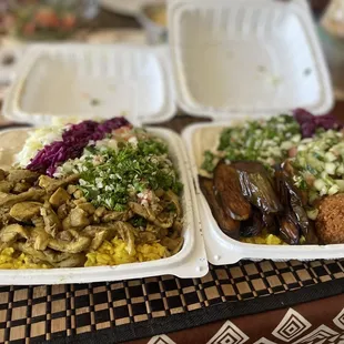two trays of food on a table