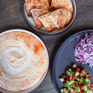 Hummus and Pita plate with a side of Israeli Salad