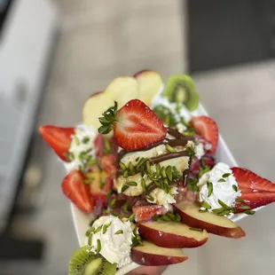 a plate of fruit salad
