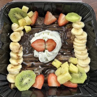 Nightmare crepe - Nutella, condensed milk, chocolate syrup with fresh fruits.
