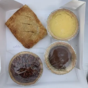 Apple hand pie, lemon chess, bourbon pecan &amp; chocolate cream mini pies $26 (total) 2.11.24