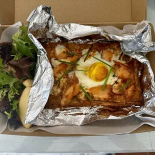 New (July 2024) chive and smoked salmon savory pie with a soft baked egg on top. Really tasty! ($13)
