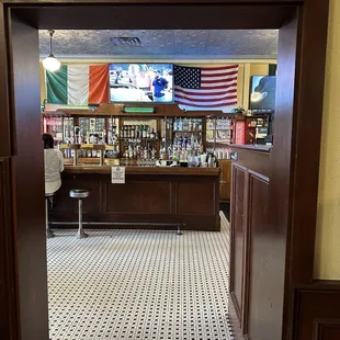 Bar area with the Ireland &amp; USA flags