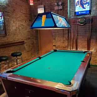 a pool table in a pub