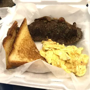 Steak and eggs  Toast Pancakes (in next pix)  Standard meal comes with tater tots. An odd option to me so I subbed pancakes.