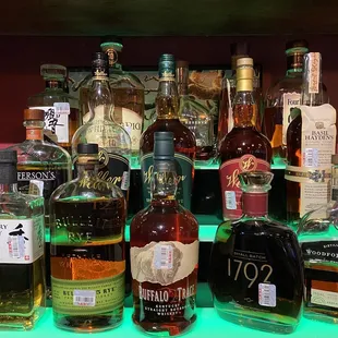 a variety of liquor bottles