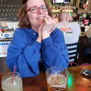 a woman sitting at a table