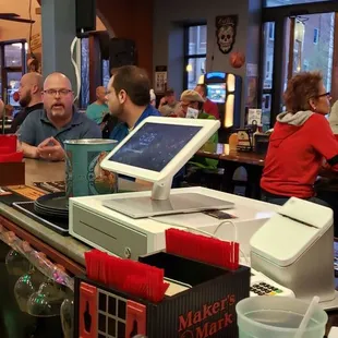 people sitting at the bar