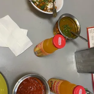 ows a table of food and condiments