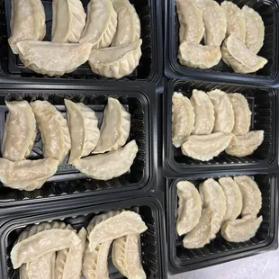 dumplings in plastic containers