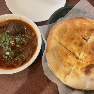 a bowl of soup and a bowl of stew