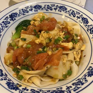 27. Hand-Ripped Noodles With Tomato & Egg Sause