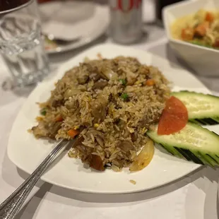 a plate of rice and vegetables