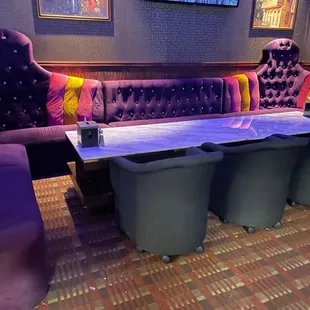 purple chairs and a table