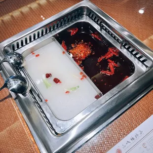 Half &amp; Half pot (bone soup &amp; nine boxes spicy) / $15.98