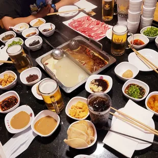 Great array of sauces and appetizer snacks at the sauce bar; both broths were excellent