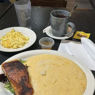 Grilled salmon and cheese grits. Scrambled eggs with cheese.